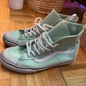 Mint green Vans high tops